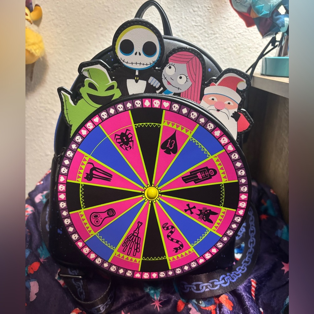 Disney Loungefly Nightmare Before Christmas Oogie’s Wheel.